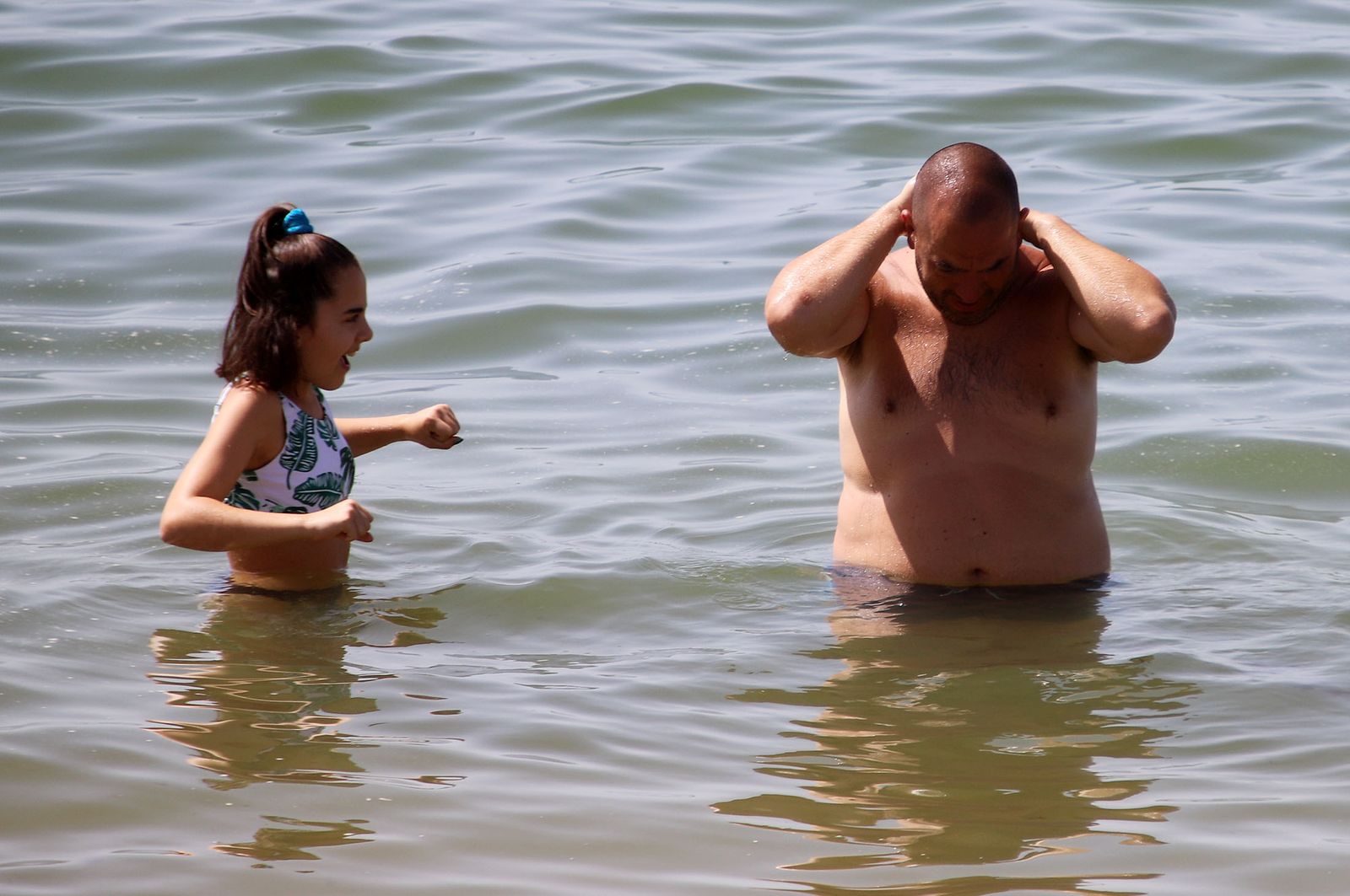 Imágenes del caluroso fin de semana en las playas de Huelva