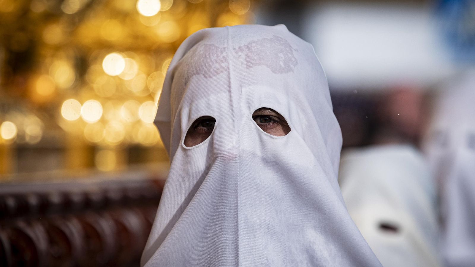 En imágenes,  El Prendimiento de San Fernando tuvo que volverse a su templo entre lágrimas y lluvia