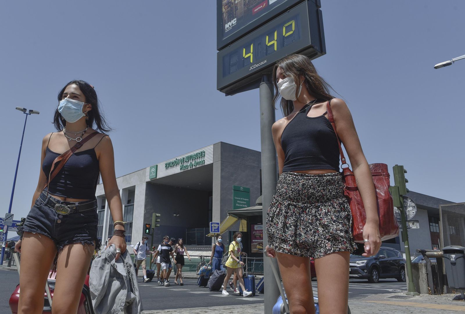 Galería gráfica: Calor y mascarillas en Sevilla