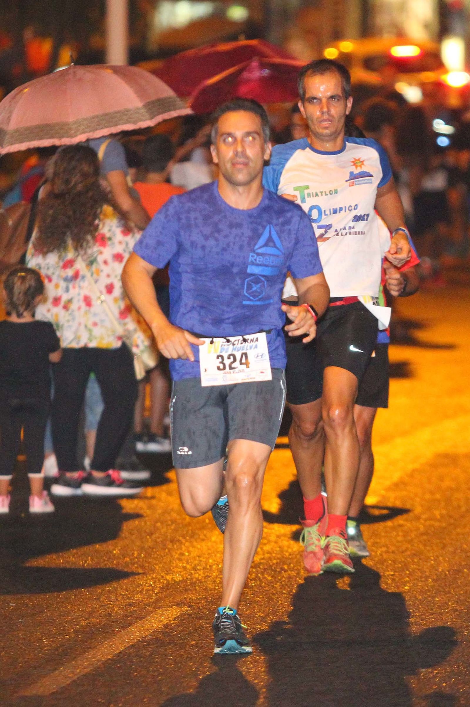 La VII Carrera Nocturna de Huelva en imágenes