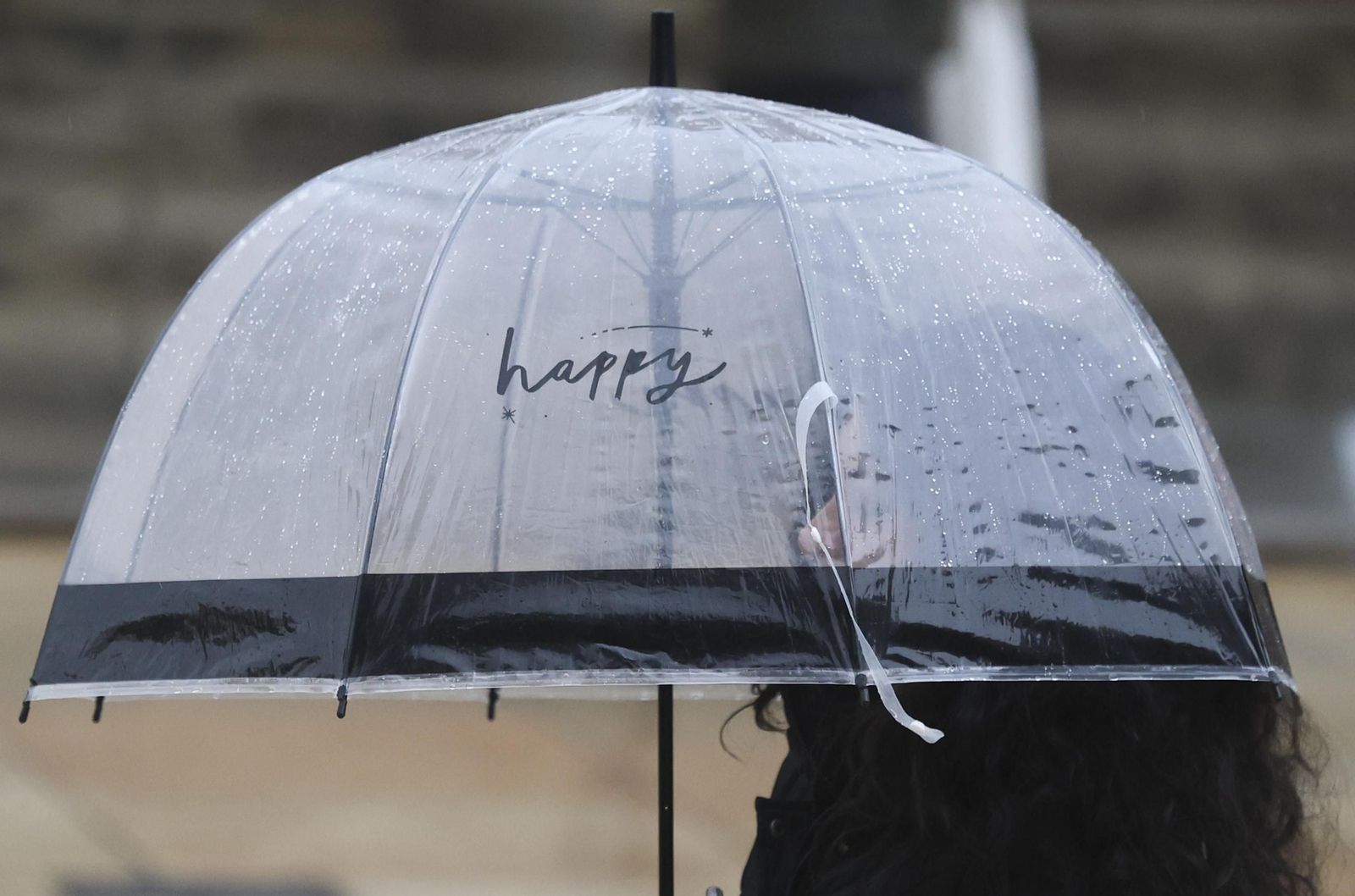 Una mujer con paraguas durante las últimas lluvias en Málaga.