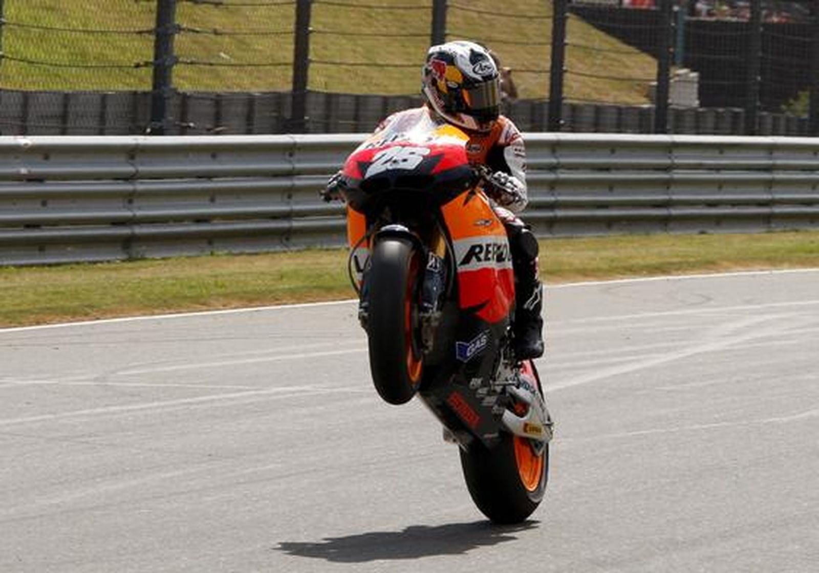 Pedrosa, Elías y Márquez firman una nueva jornada memorable para el motociclismo español. / Reportaje gráfico: EFE, Reuters, AFP.