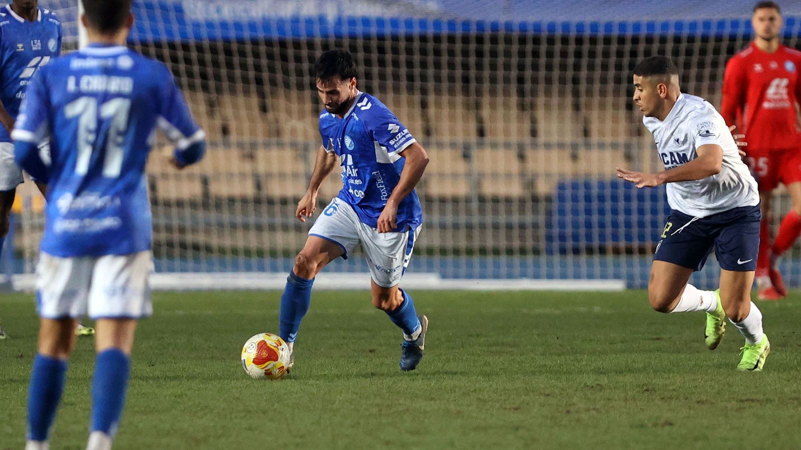 Imágenes del Xerez DFC contra el UCAM Murcia CF en Chapín