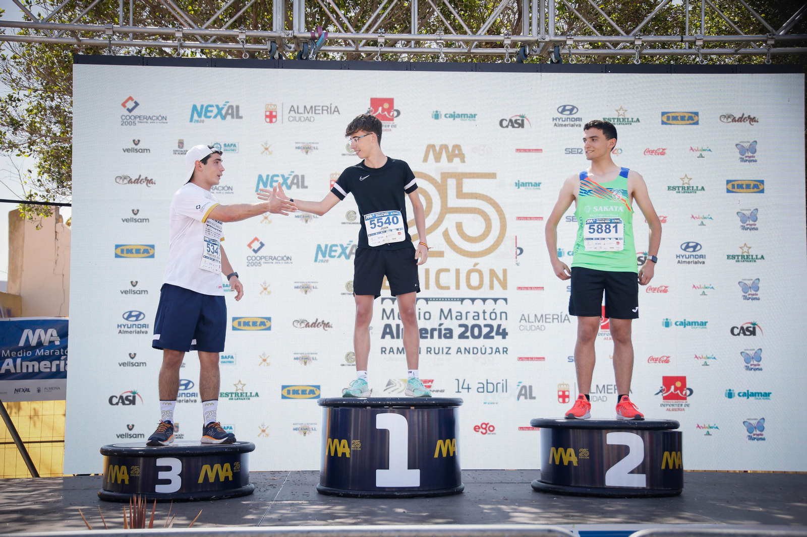 Imágenes de los premiados en la Media maratón de la Cuidad de Almería