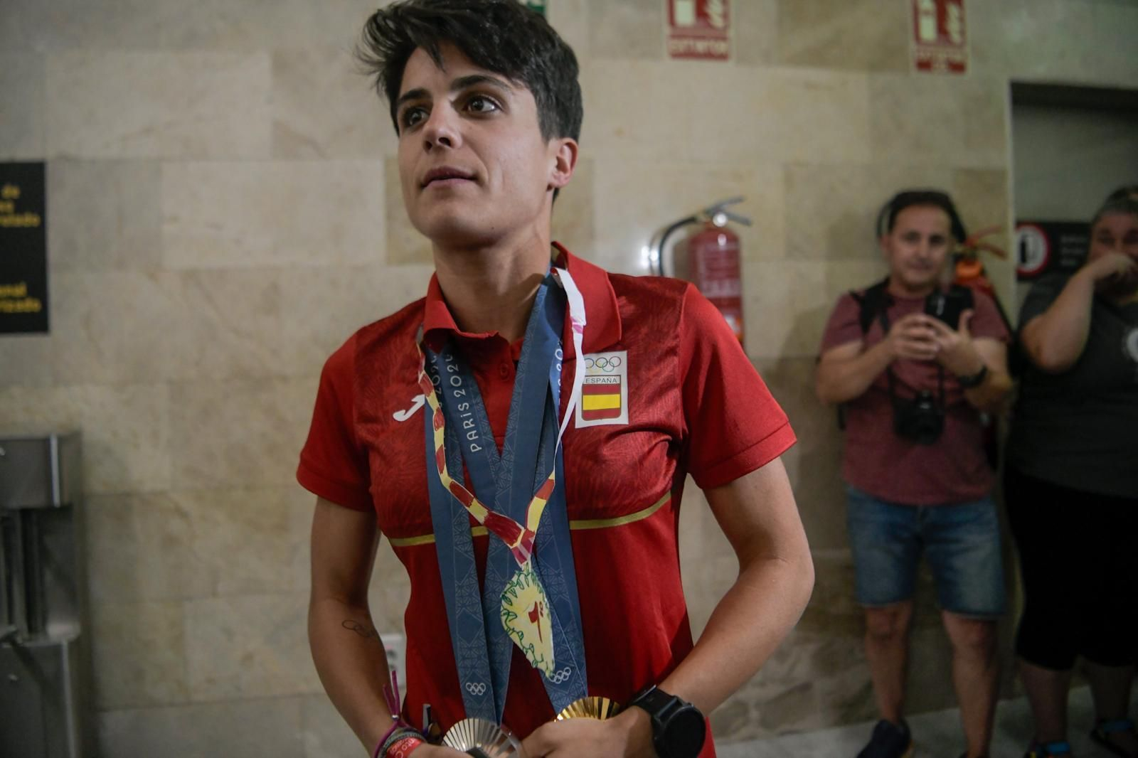 Granada recibe a la campeona María Pérez, en imágenes