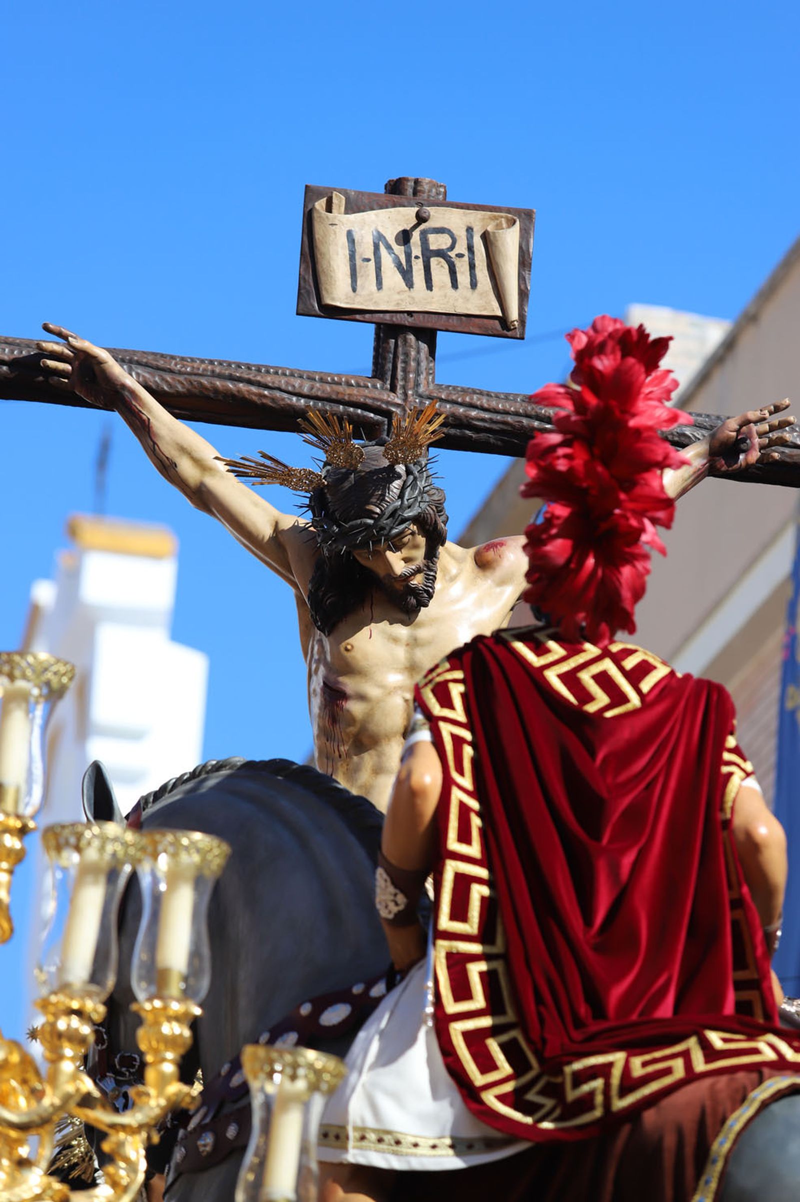 Imágenes de la procesión de la hermandad de la Lanzada de Huelva