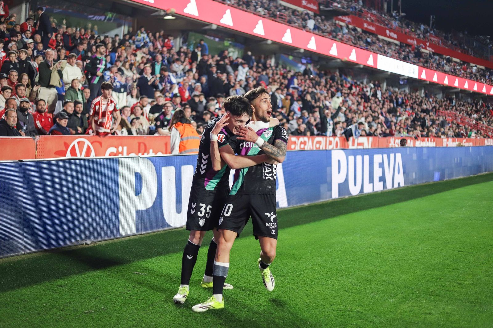 Ochoa y Larrubia celebran.