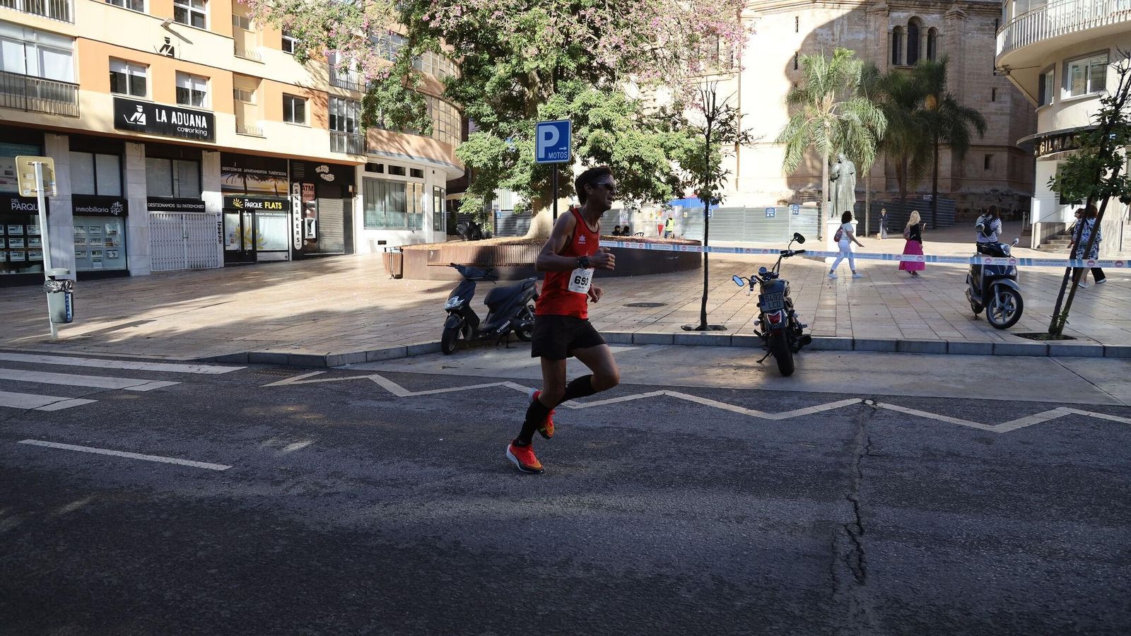 Búscate en las fotos de la Carrera de la Prensa en Málaga