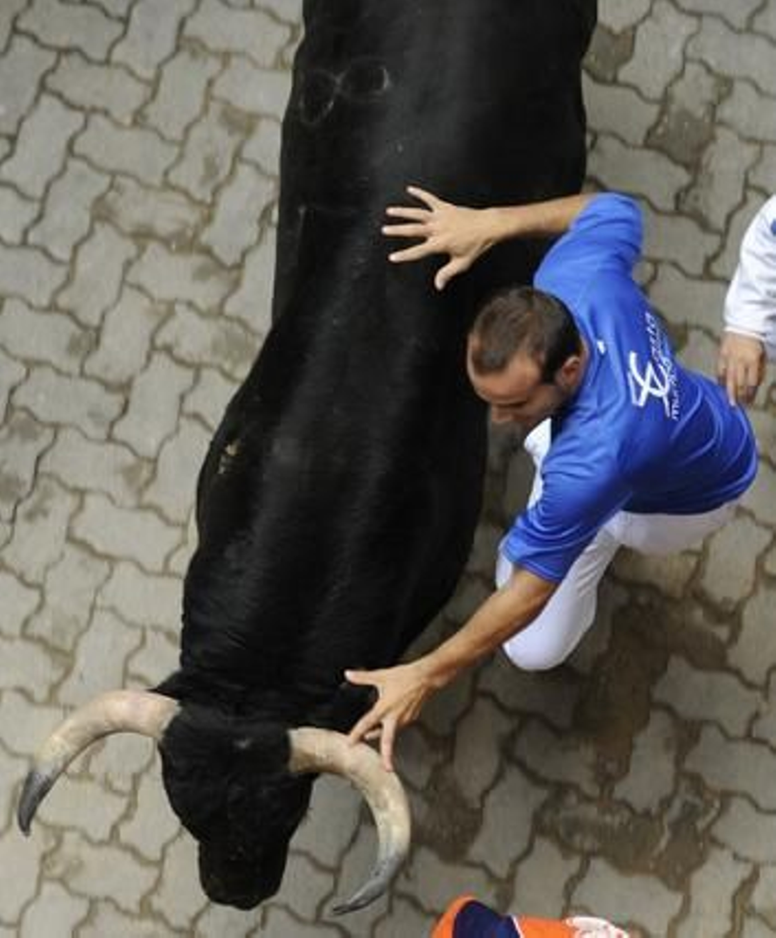 Los toros de El Pilar protagonizan un encierro rápido, limpio y sin corneados

Foto: AFP PHOTO