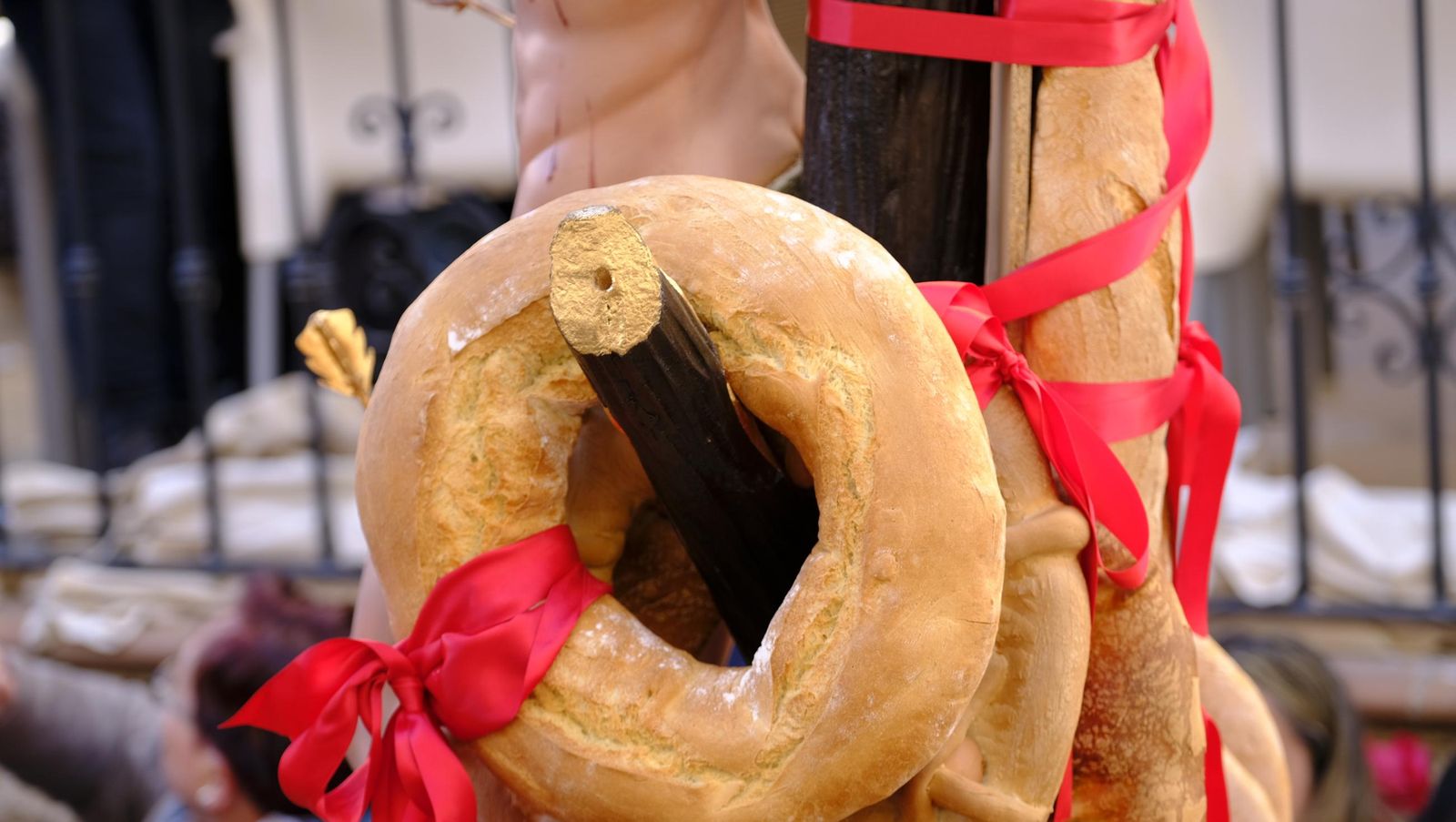 Procesión de San Sebastián y tirada de roscos en Lubrín, en imágenes