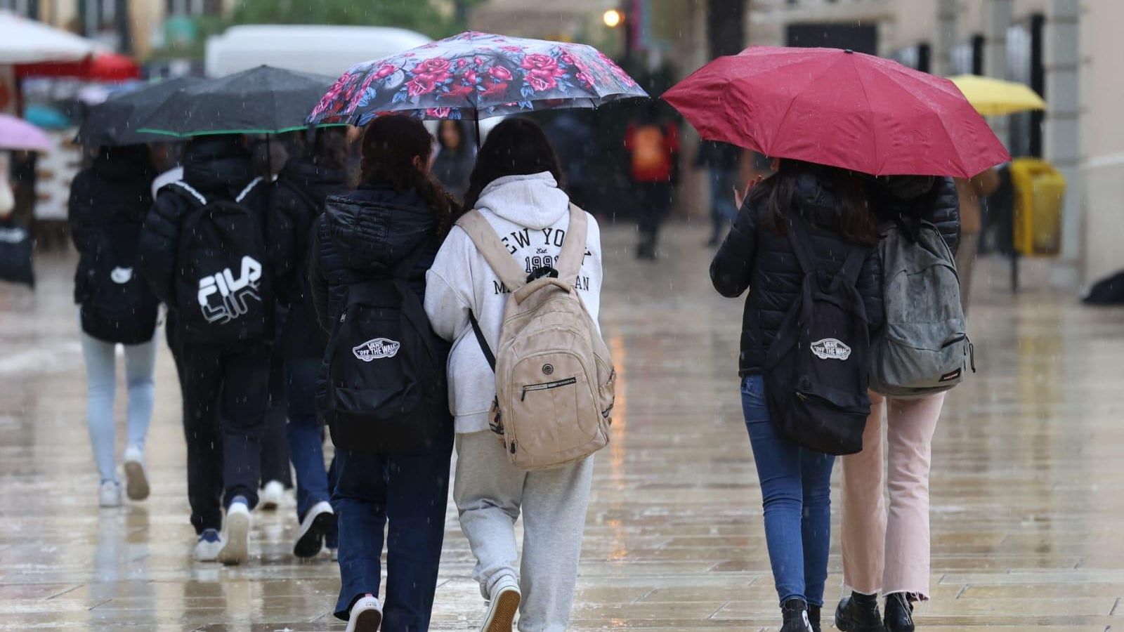 Lluvias y tormentas en Málaga en la jornada de aviso naranja, en imágenes