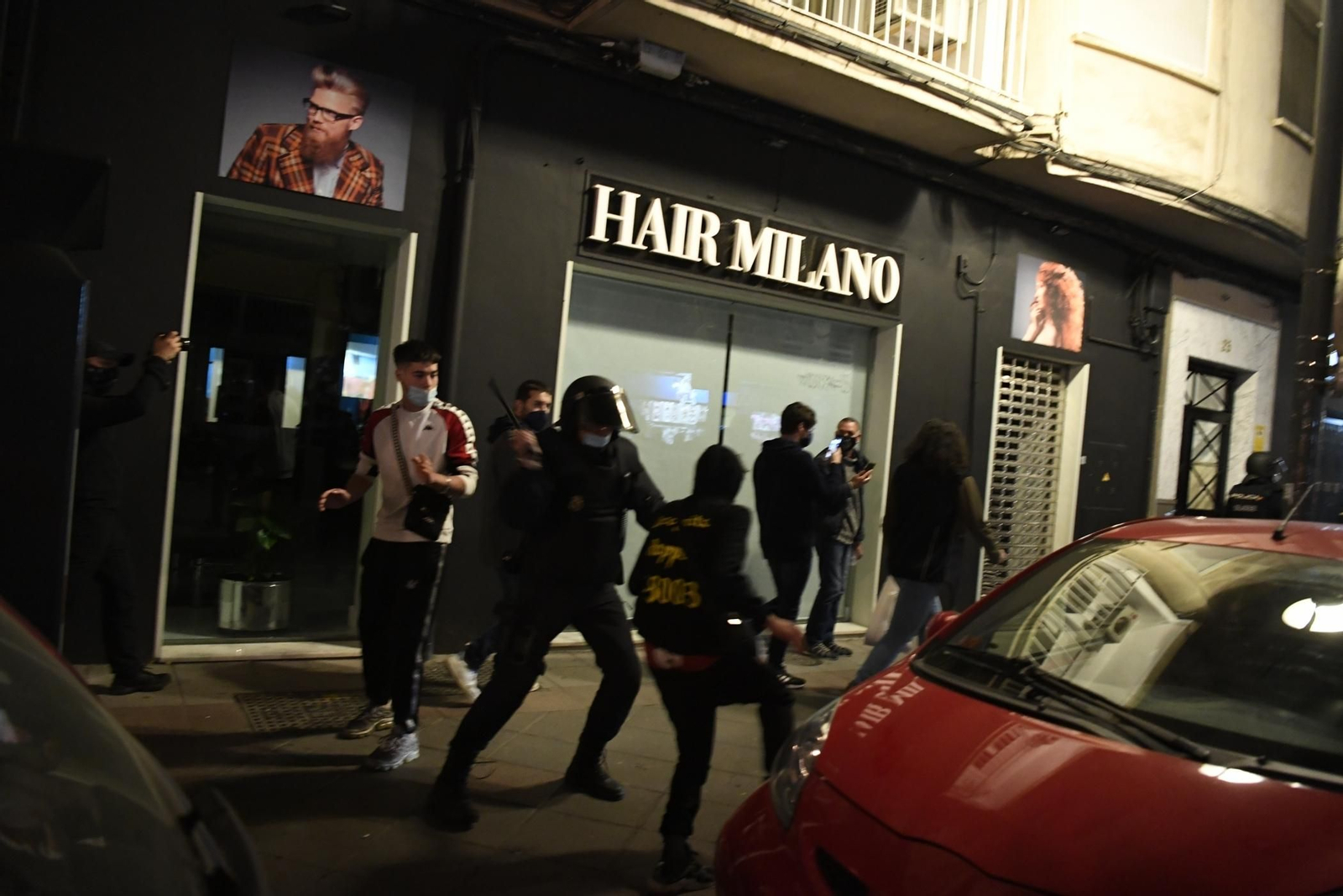 Fotos: disturbios y altercados entre manifestantes y la Policía en Granada