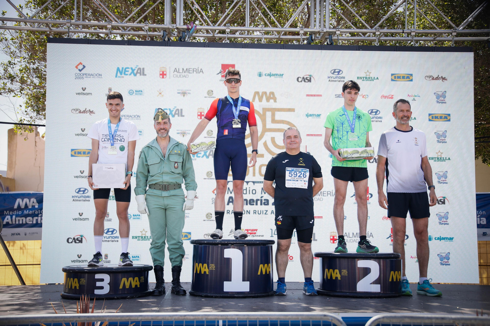 Imágenes de los premiados en la Media maratón de la Cuidad de Almería