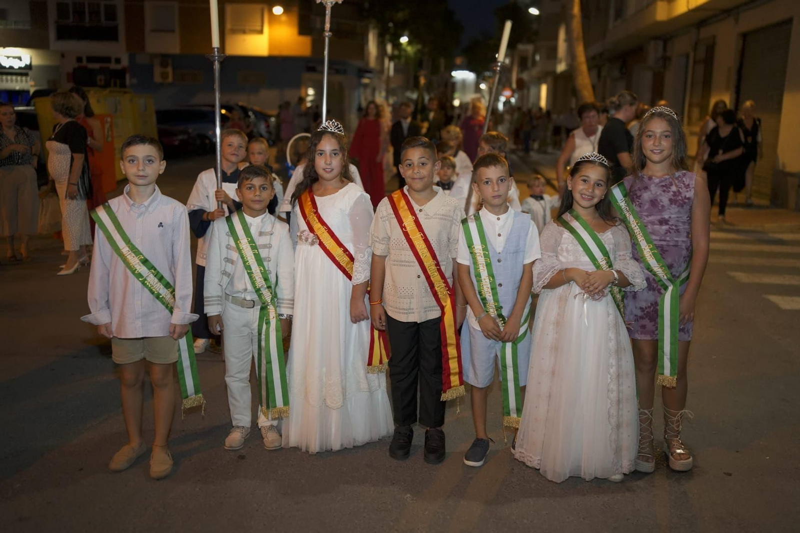 La procesión de la Virgen del Mar por las calles de Adra, en imágenes