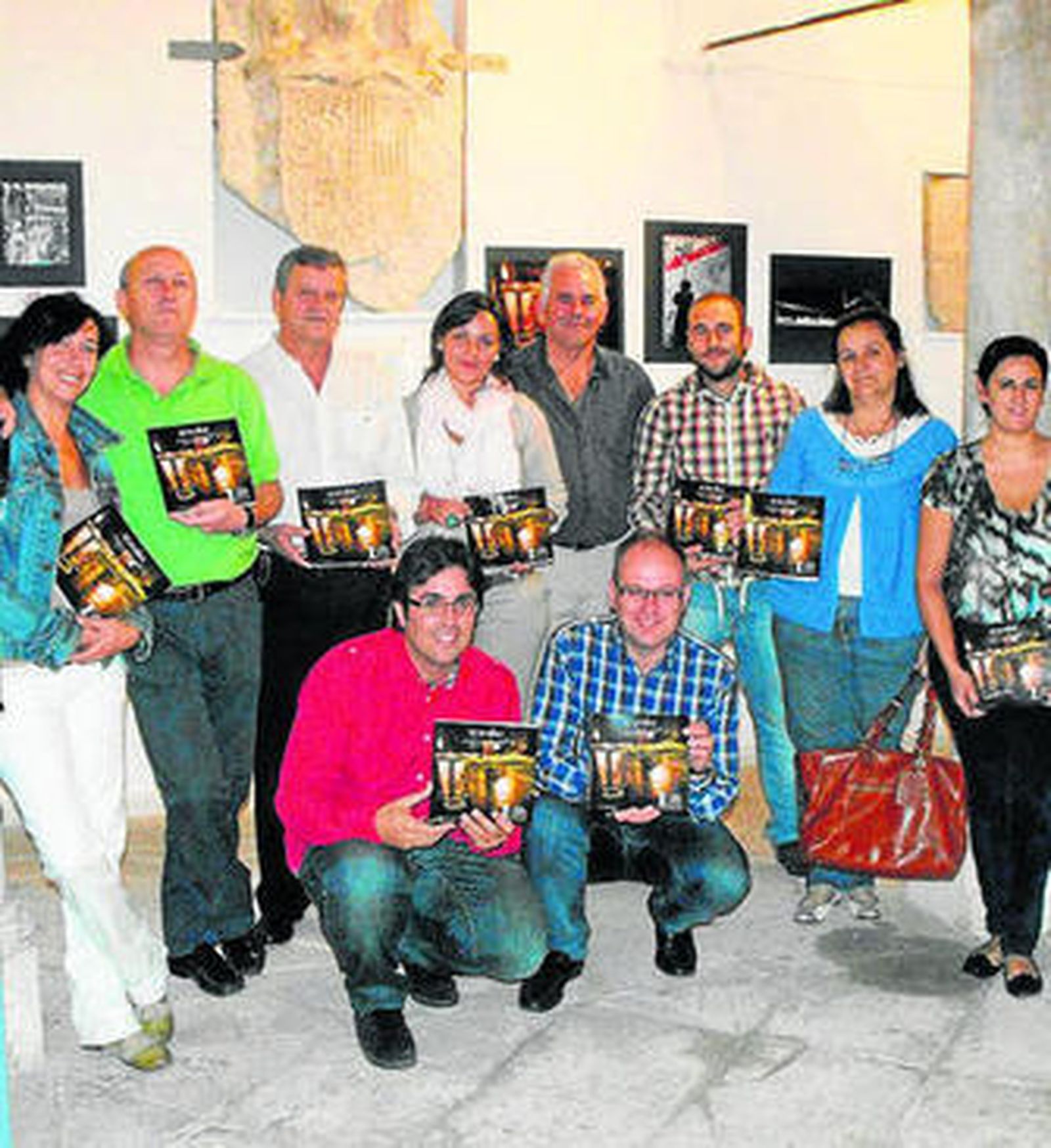 Algunos de los fotógrafos que han participado en la muestra.