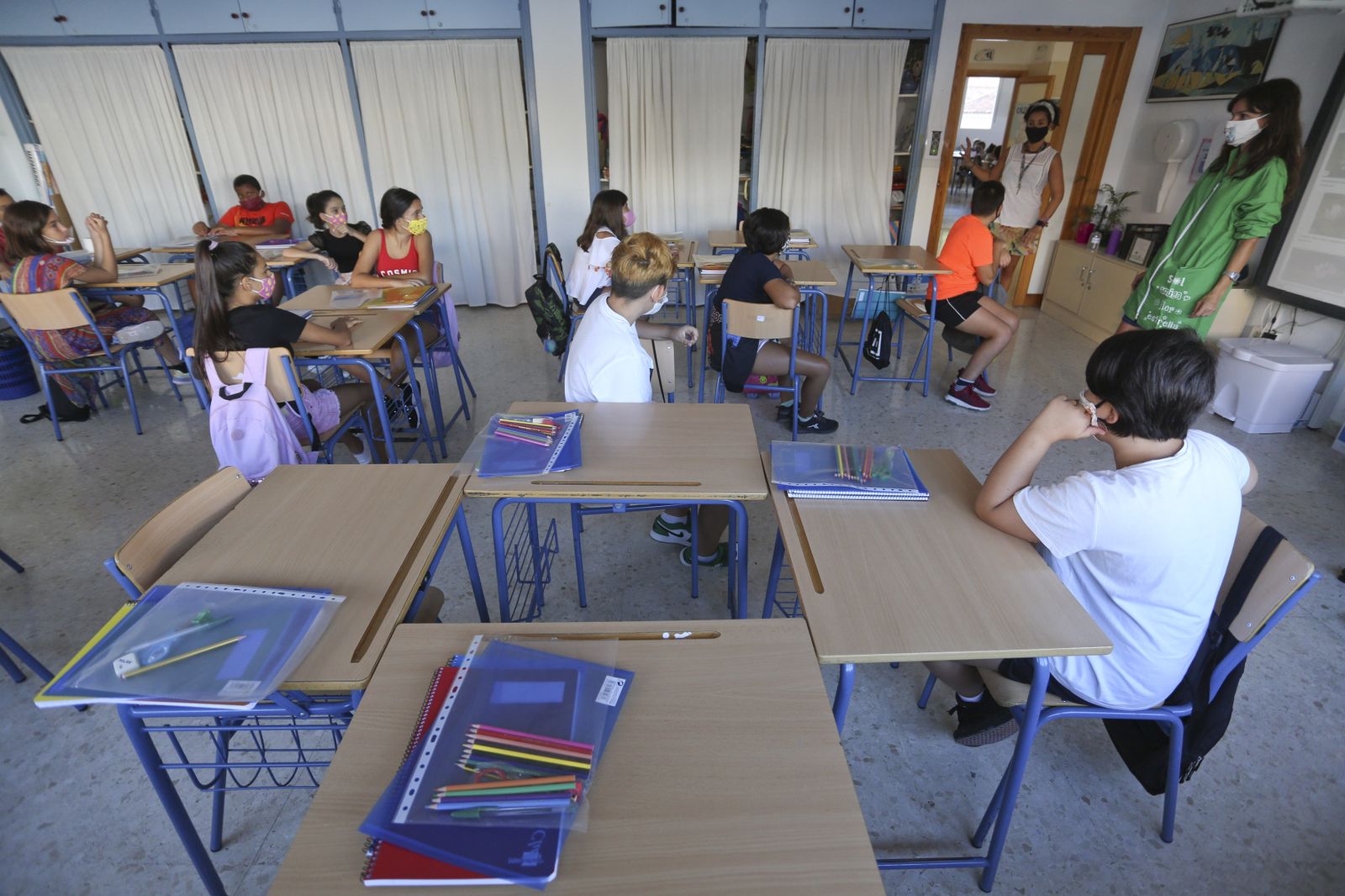 Vuelta al cole en Málaga: Fotos de un día de nervios y mascarillas