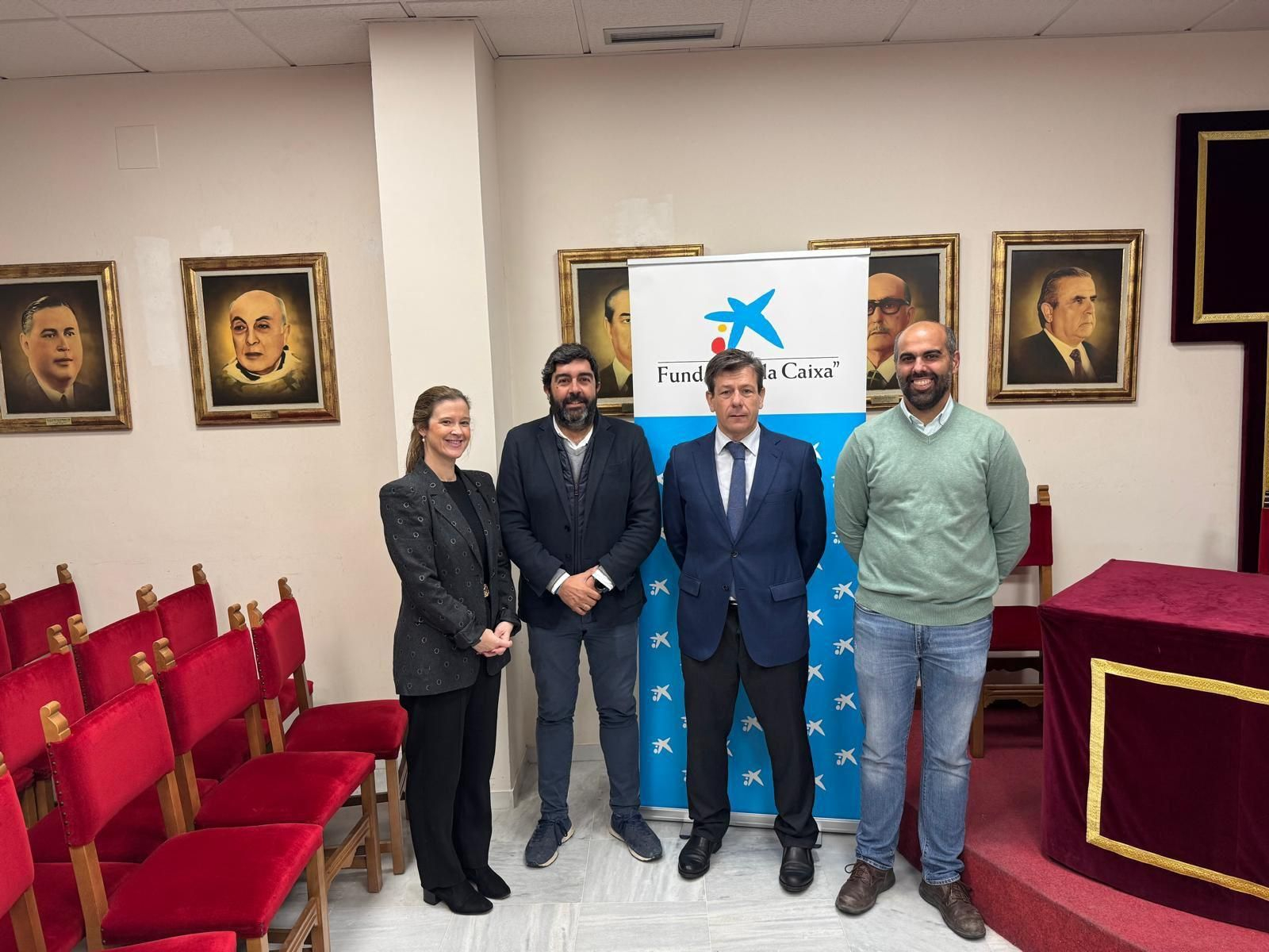 Representantes de la Unión de Hermandades y de la Fundación La Caixa.