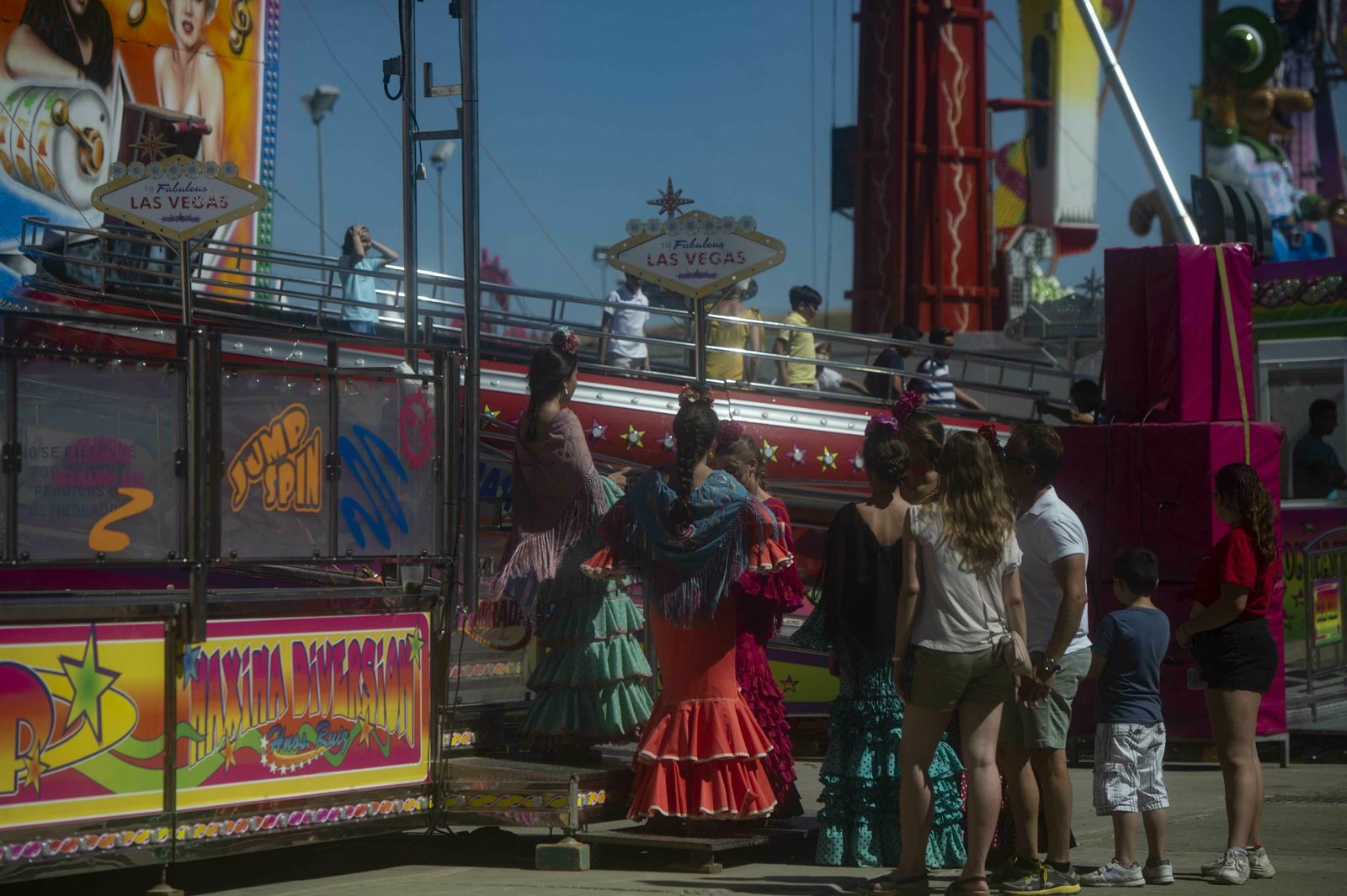 El botellón y la calle del Infierno de la Feria, en imágenes