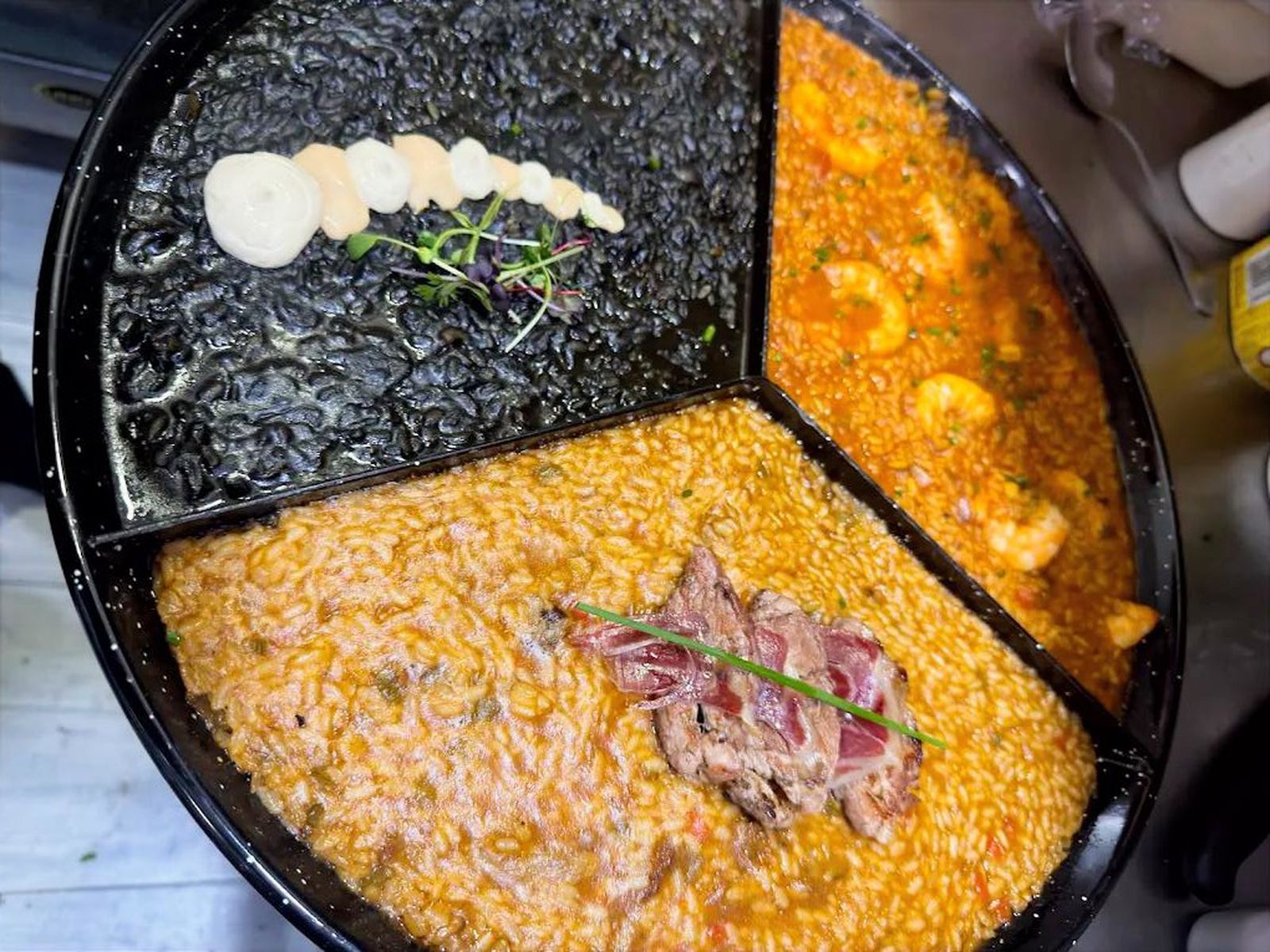 Trío de Arroces del restaurante Aires de Mar, en Jerez norte.