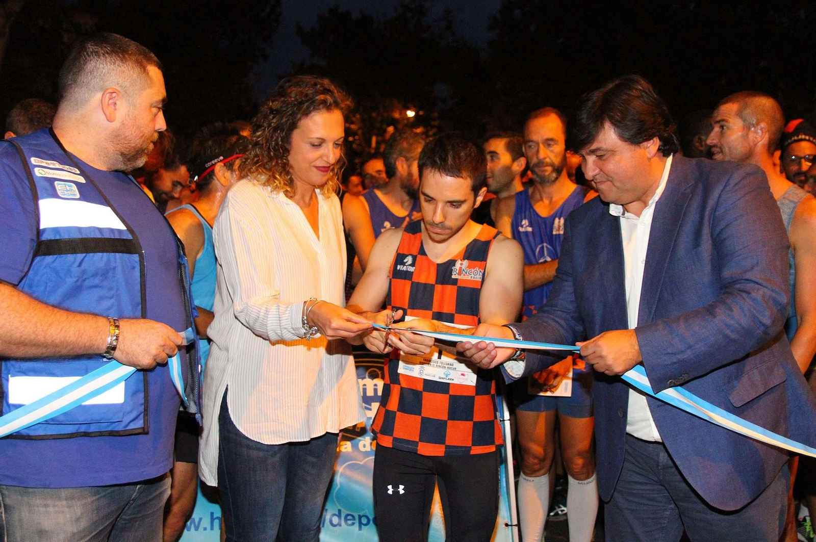 La VII Carrera Nocturna de Huelva en imágenes