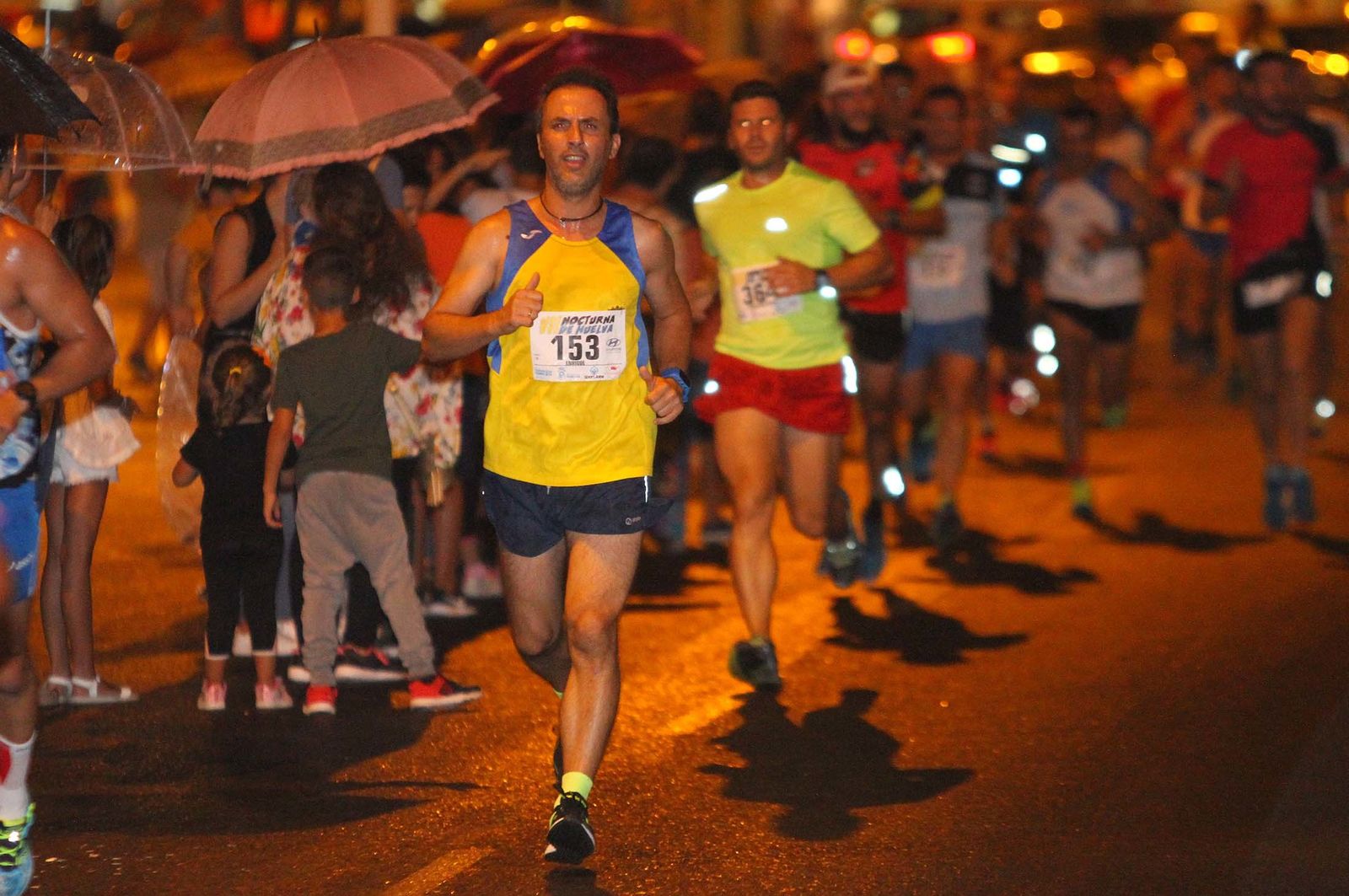 La VII Carrera Nocturna de Huelva en imágenes