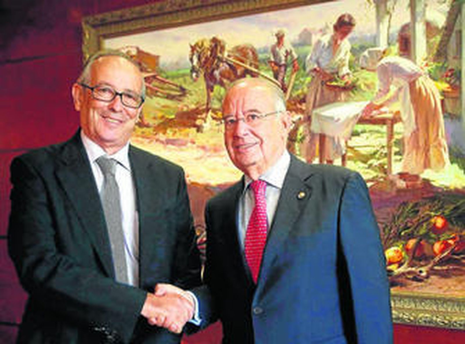 Los presidentes de Ruralcaja, Eduardo Ferrer Perales, y de Cajamar Caja Rural, Antonio Pérez Lao.