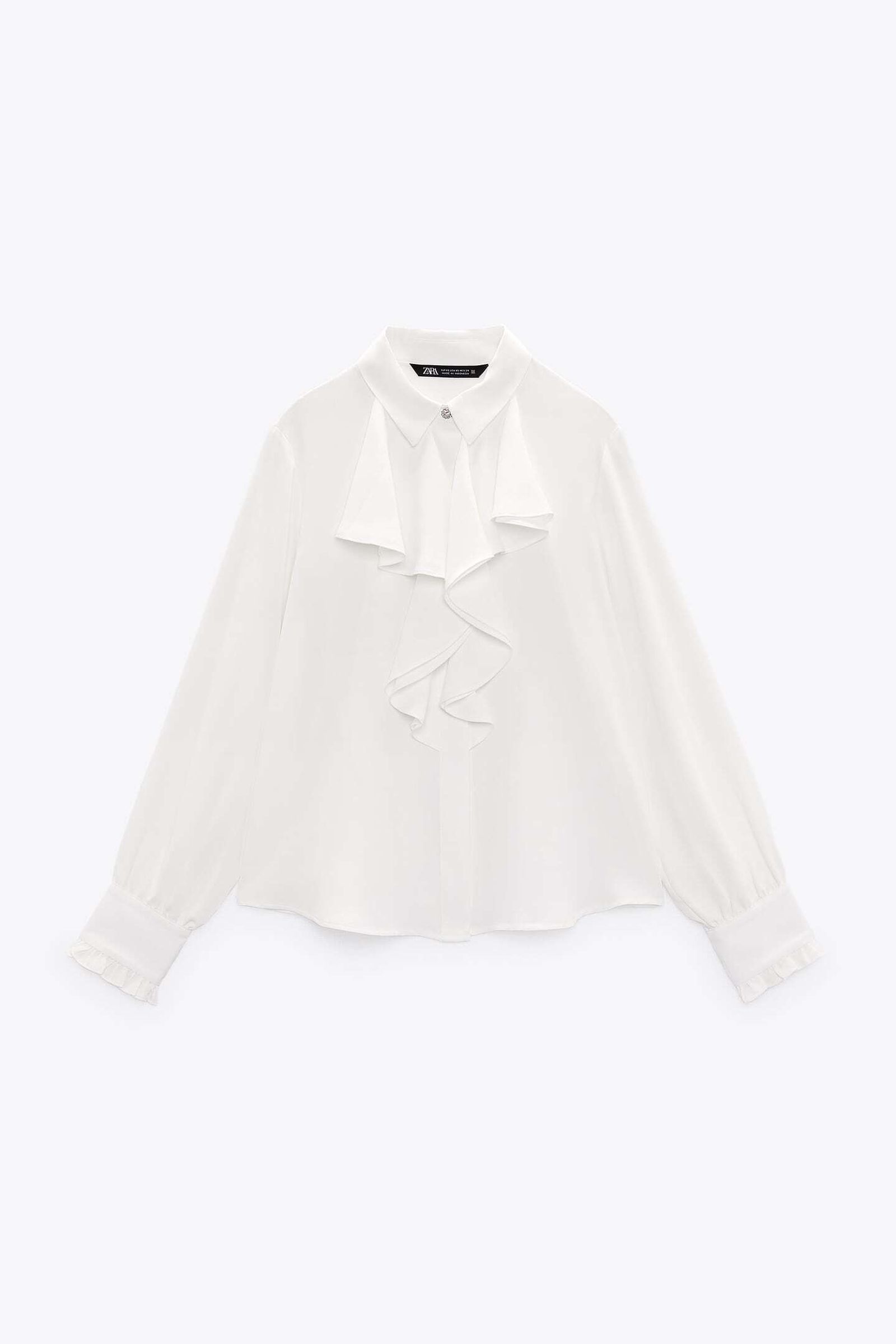 Blusa blanca de Zara.