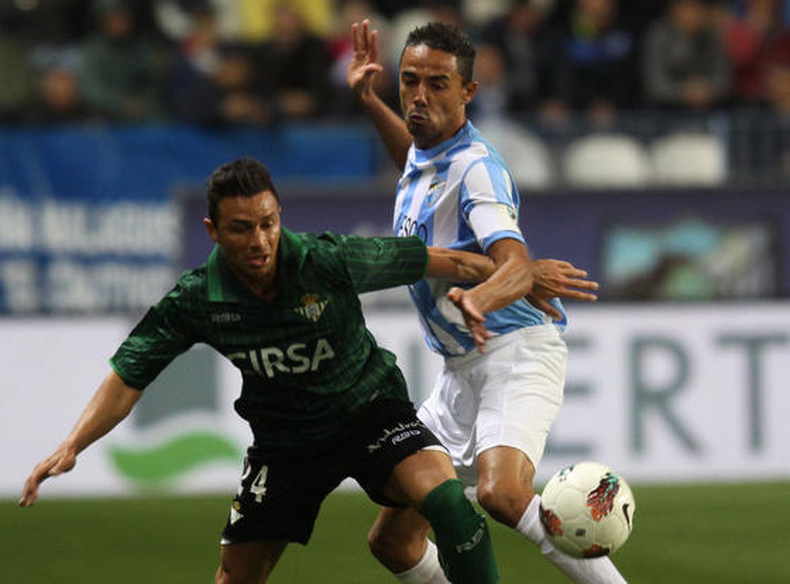 El Betis vence al Málaga en La Rosaleda (0-2). / Migue Fernández