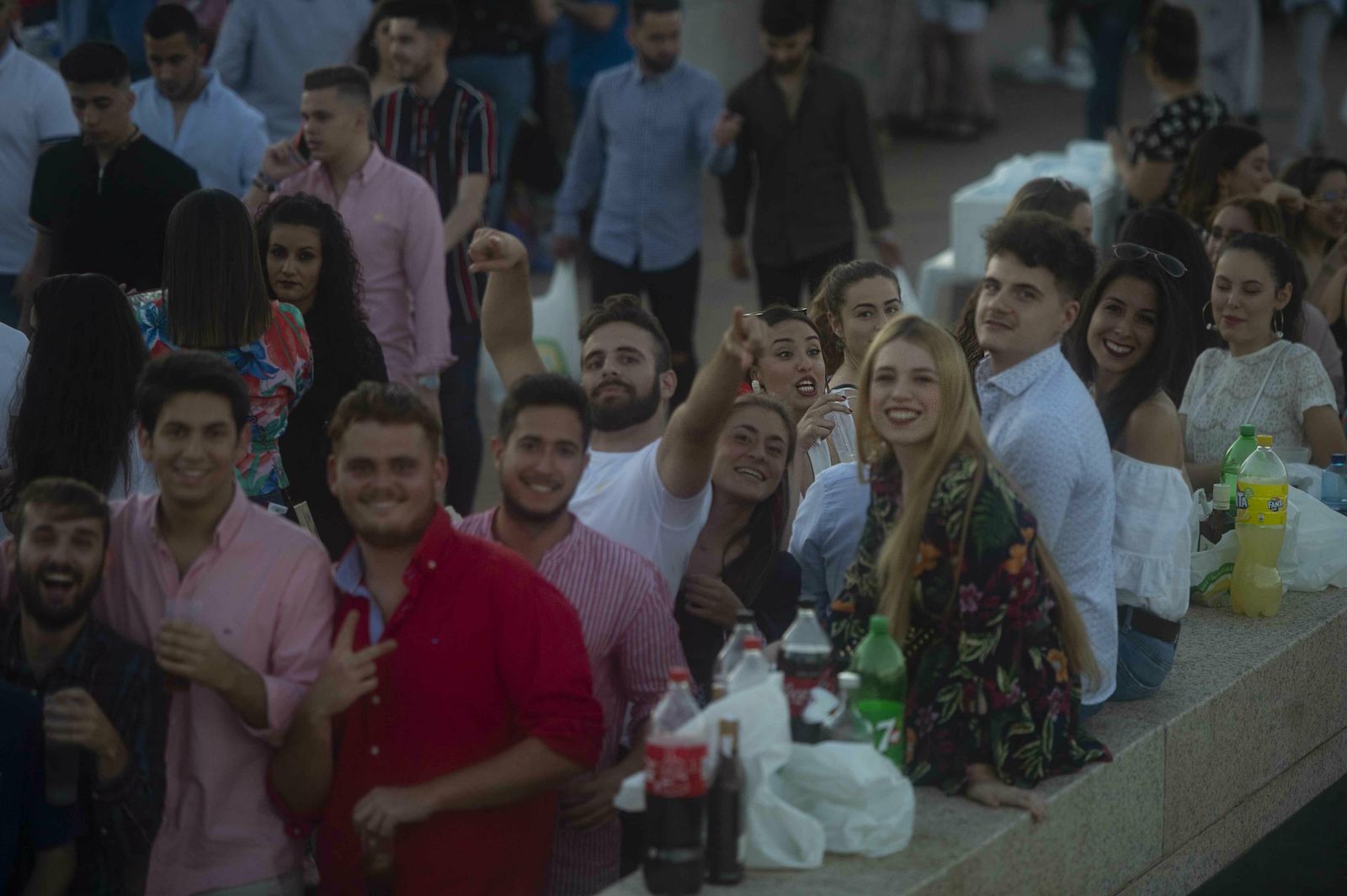 El botellón y la calle del Infierno de la Feria, en imágenes