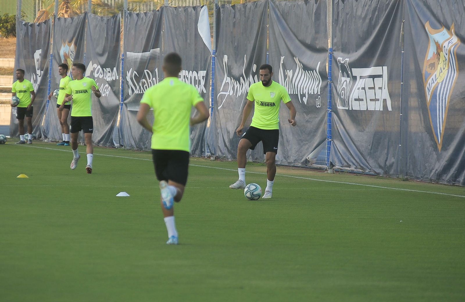 Las fotos del entrenamiento del Málaga CF tras la tormenta