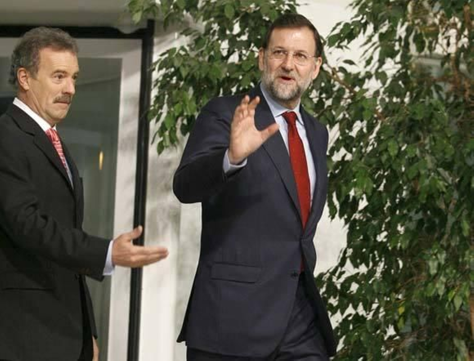 Rajoy y Zapatero llegan al Palacio de Congresos