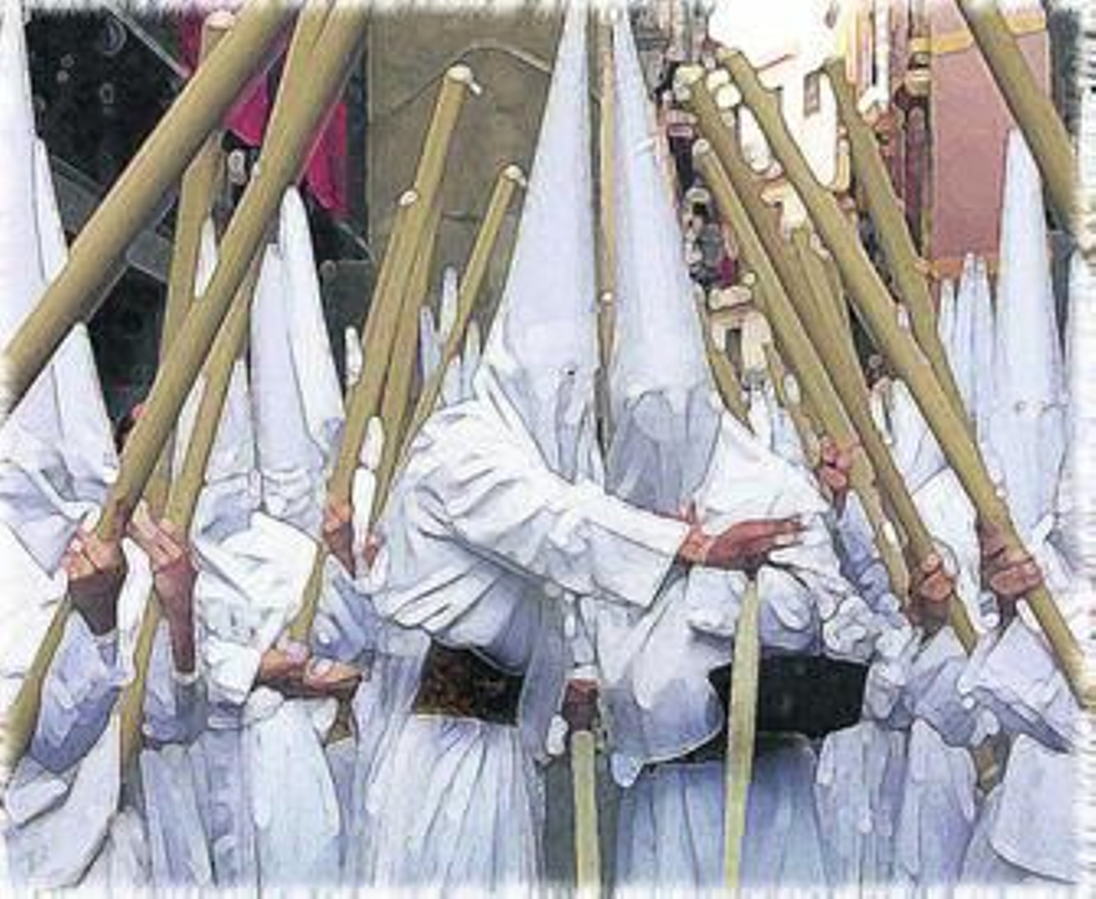 Un tramo de nazarenos de una hermandad de penitencia.