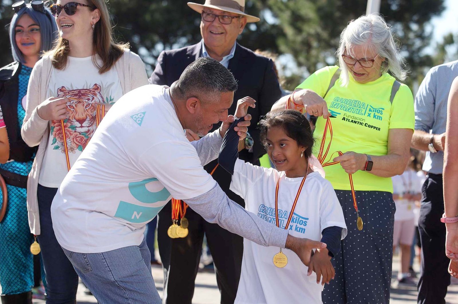 Imágenes de la carrera infantil previa a la "10K Puerta del Descubrimiento"