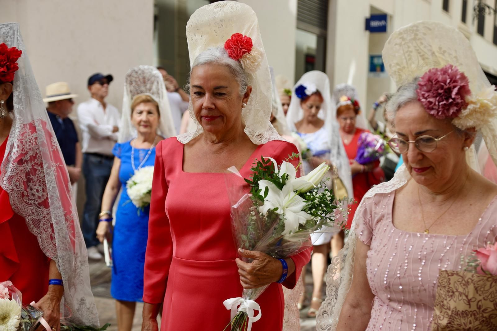 La misa estacional y el pasacalles previo a la procesión de la Victoria en Málaga, en imágenes
