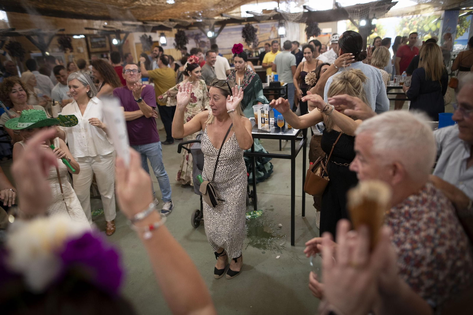 Granada vive su tercer día de Corpus entre comida, baile y columpios: las imágenes
