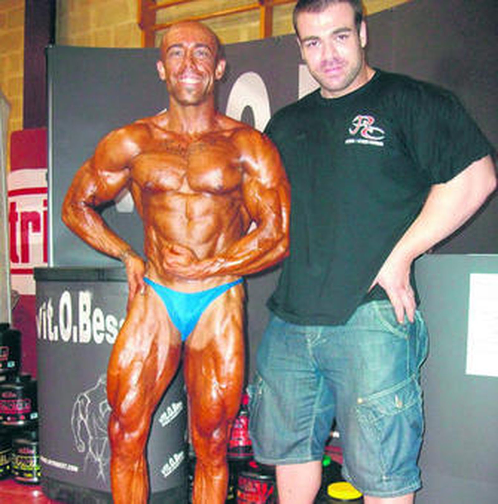 Fran Mosqueda y su entrenador, Javier Aguilar.