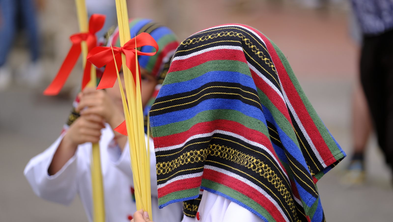 La Borriquita procesiona por las calles de Almería, en imágenes