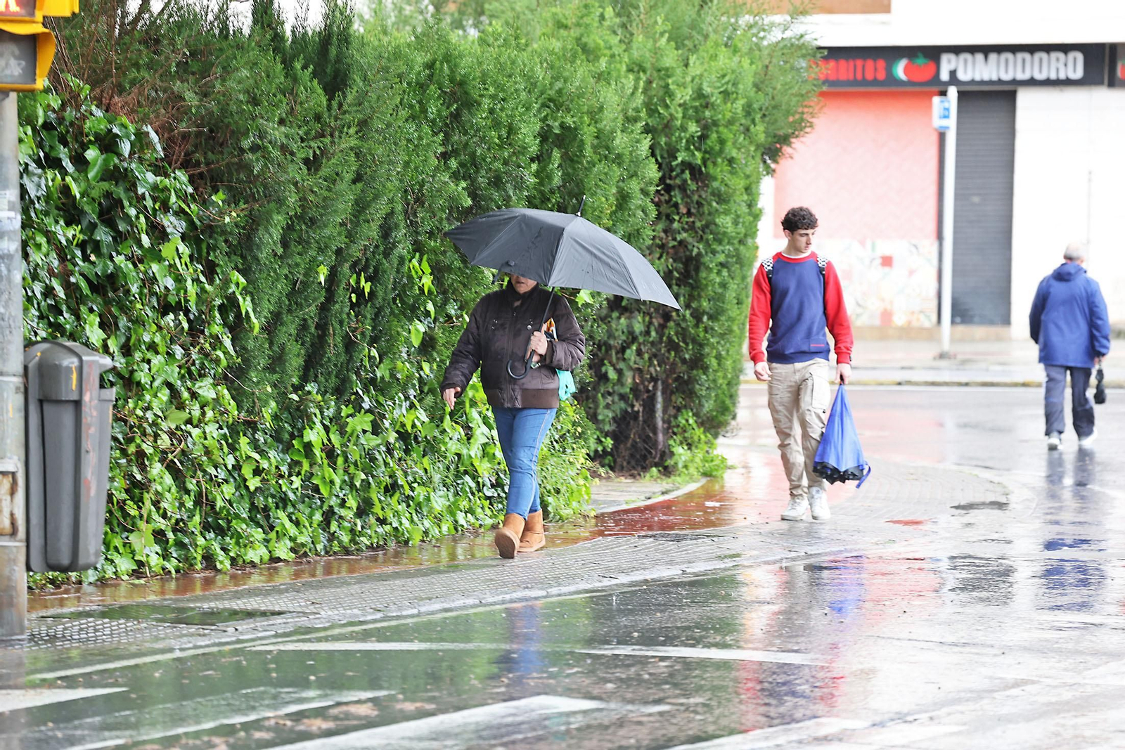 Las imágenes de la lluviosa mañana del jueves 13 de marzo en Huelva