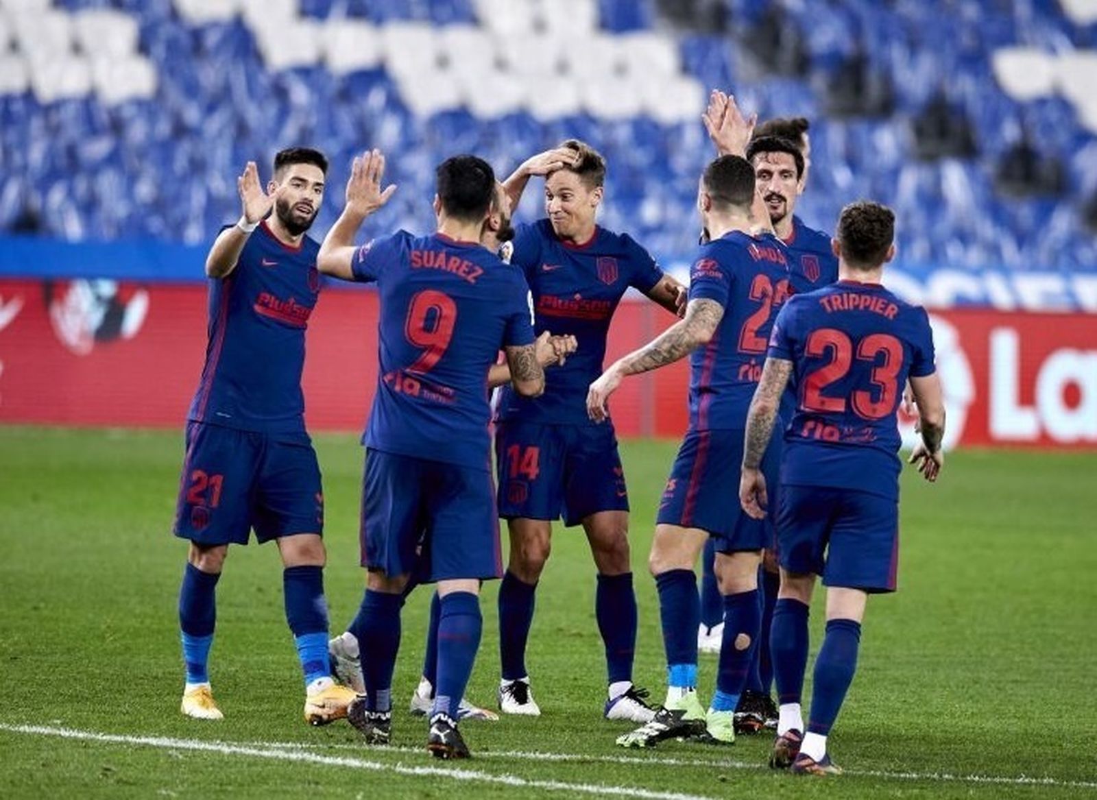 Los jugadores del Atlético de Madrid celebran uno de sus tantos.