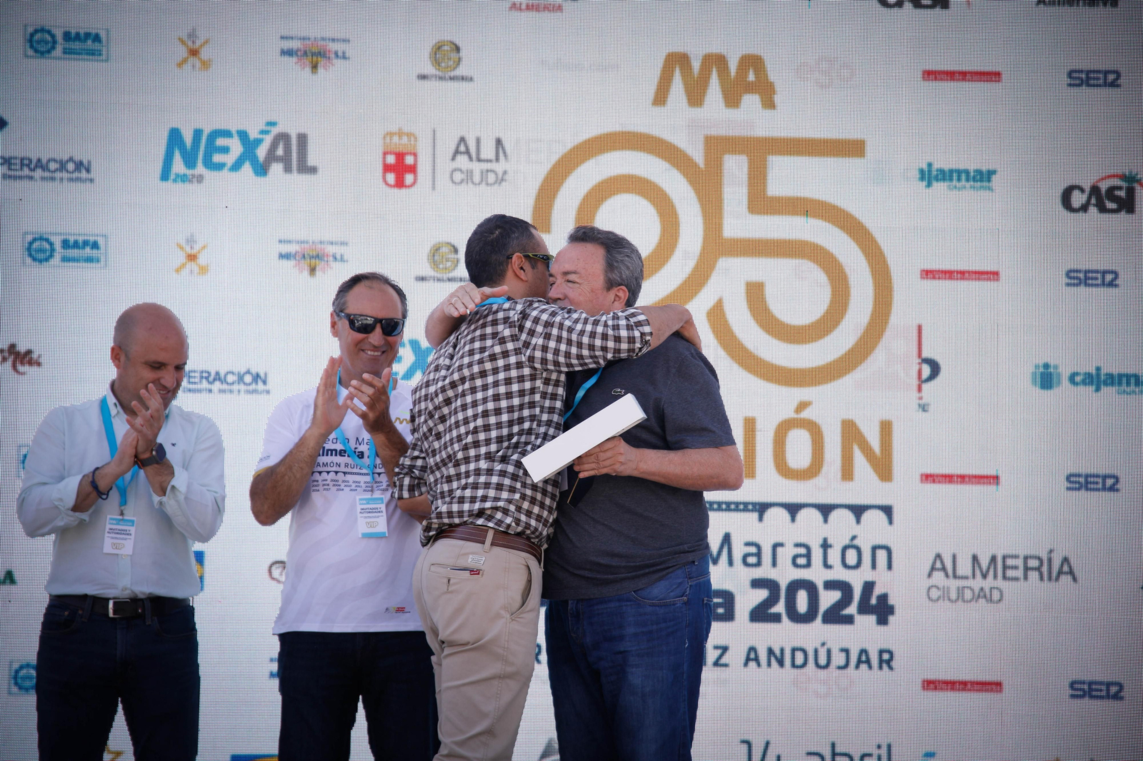 Imágenes de los premiados en la Media maratón de la Cuidad de Almería