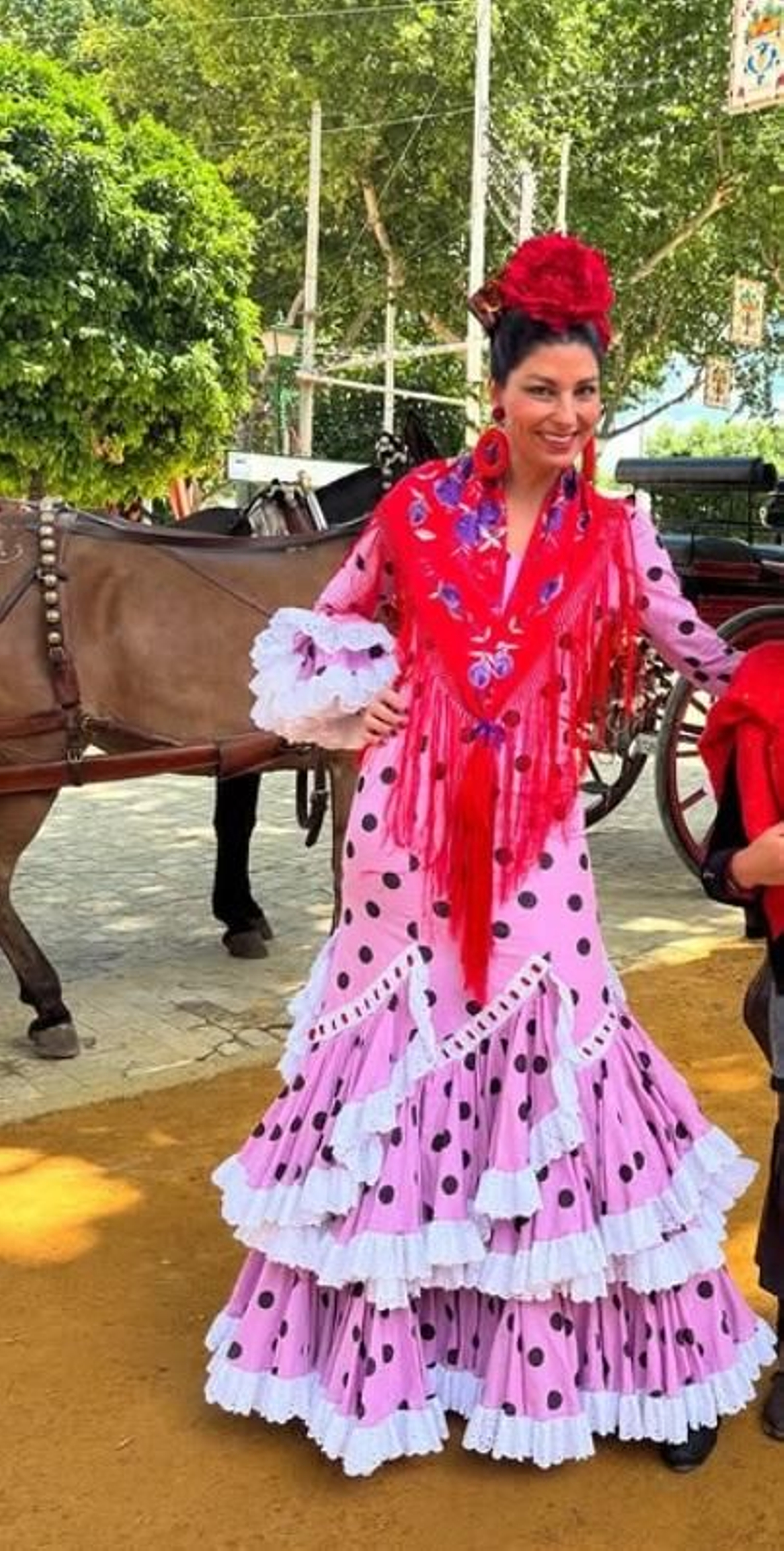 Rocío Peralta vestida de flamenca en la Feria de Abril.
