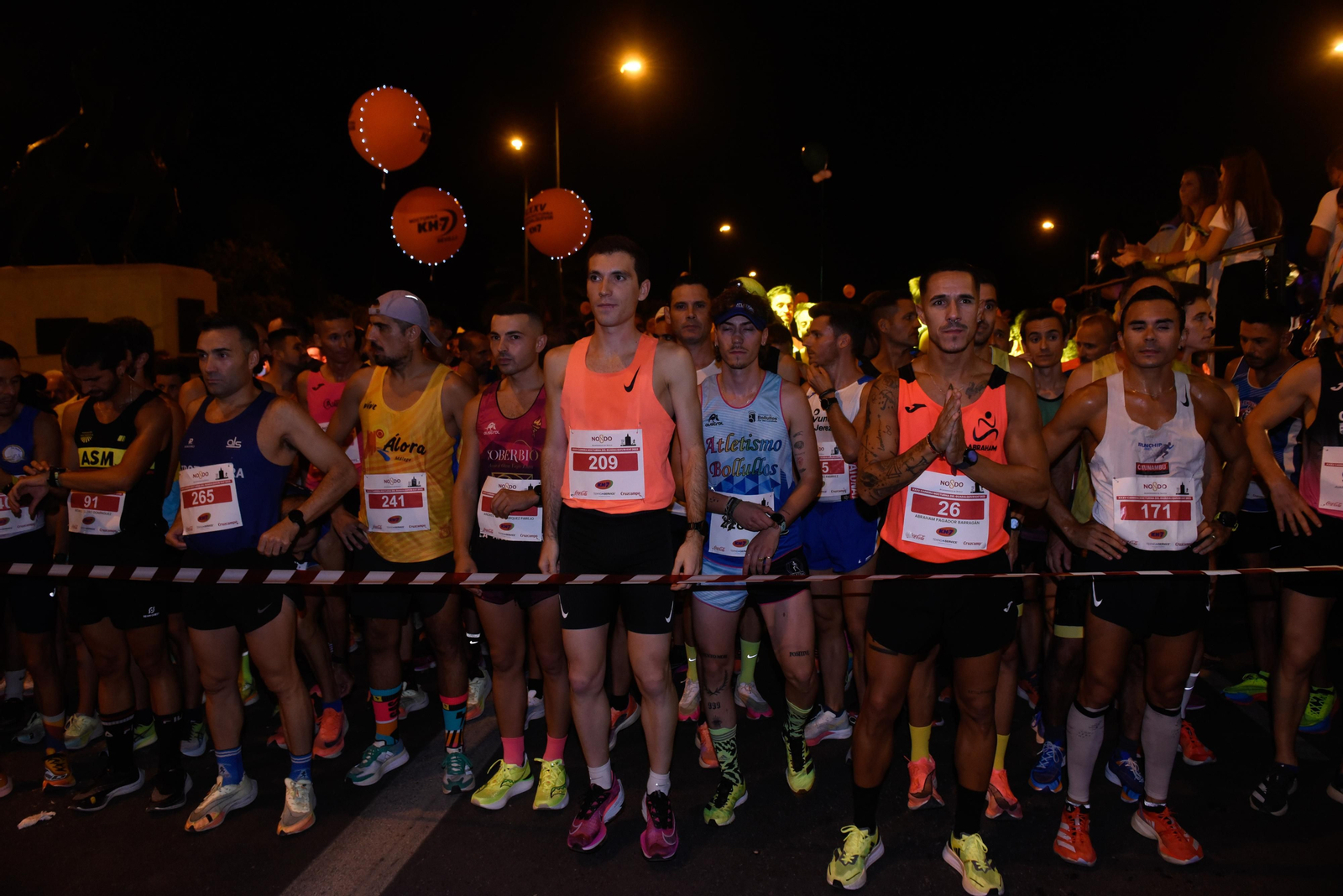 La salida de la XXXV Carrera Nocturna del Guadalquivir, en imágenes