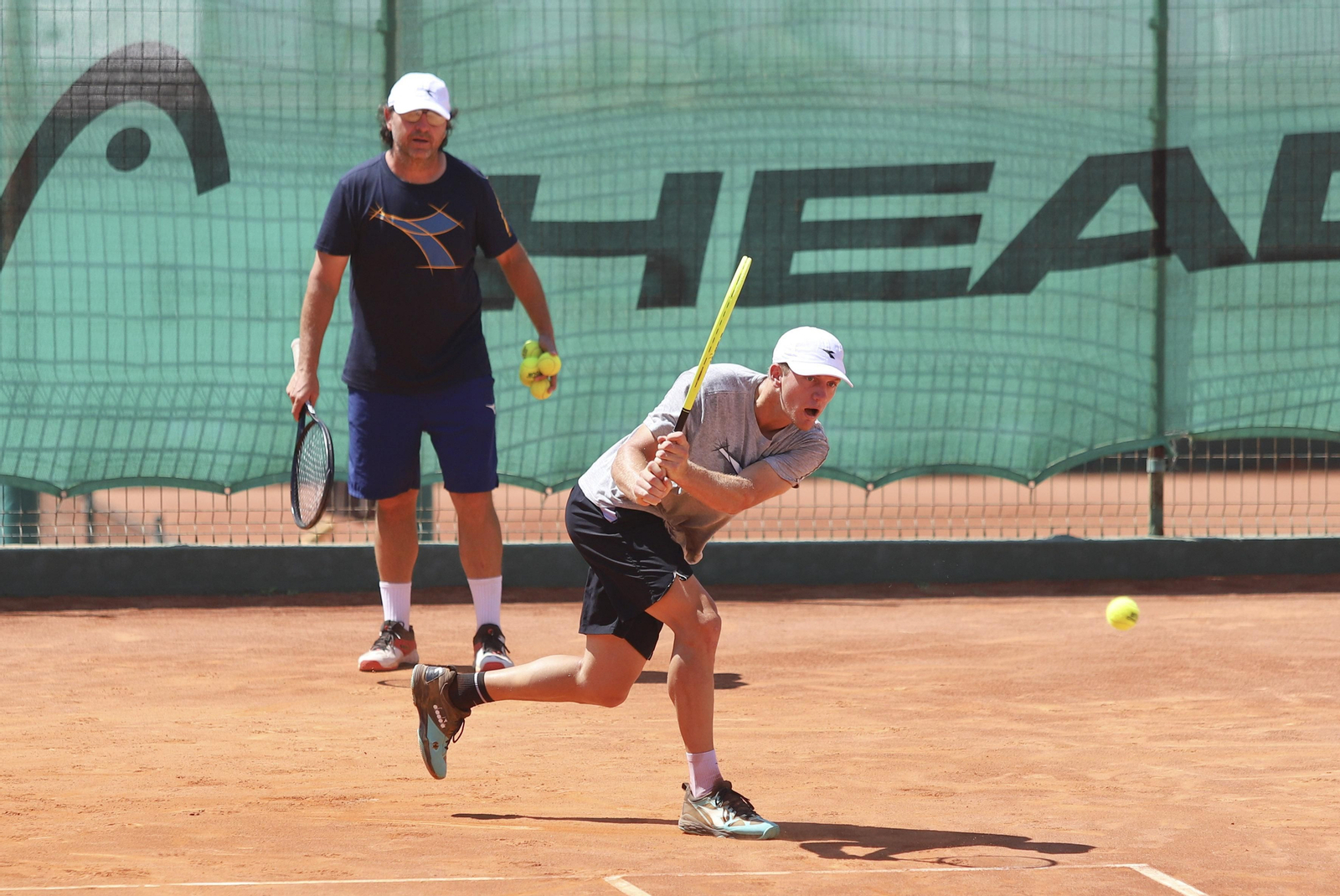 Davidovich y su entrenador, Jorge Aguirre.