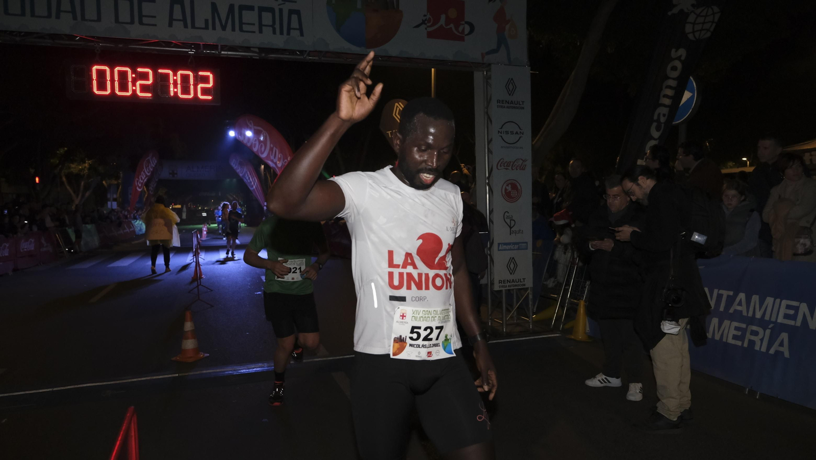 Imágenes de la XIV edición de la San Silvestre de Almería