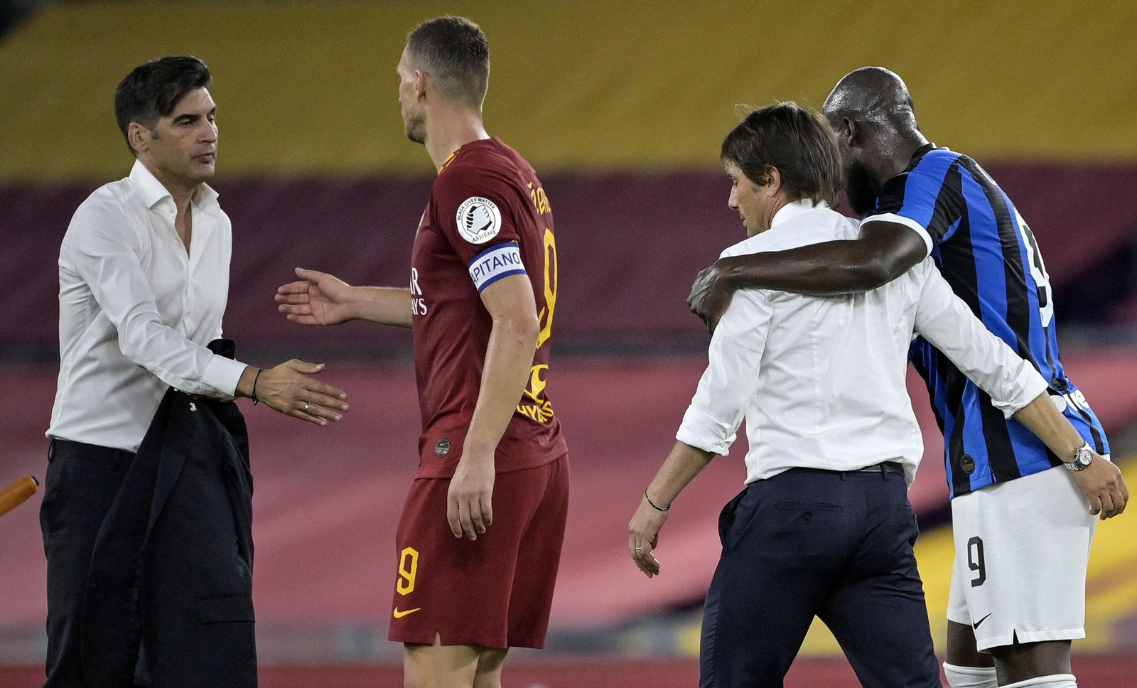 Fonseca y Dzeko, junto a Conte y Lukaku en el reciente Roma-Inter (2-2).