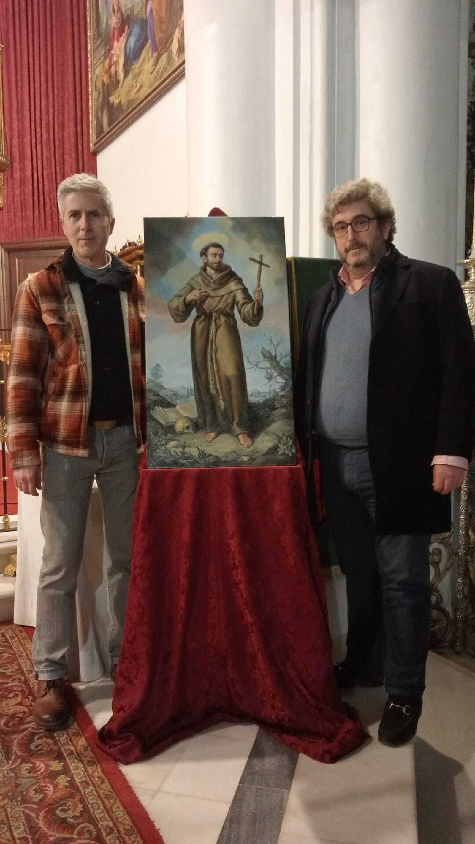 Momento de entrega de la pintura.