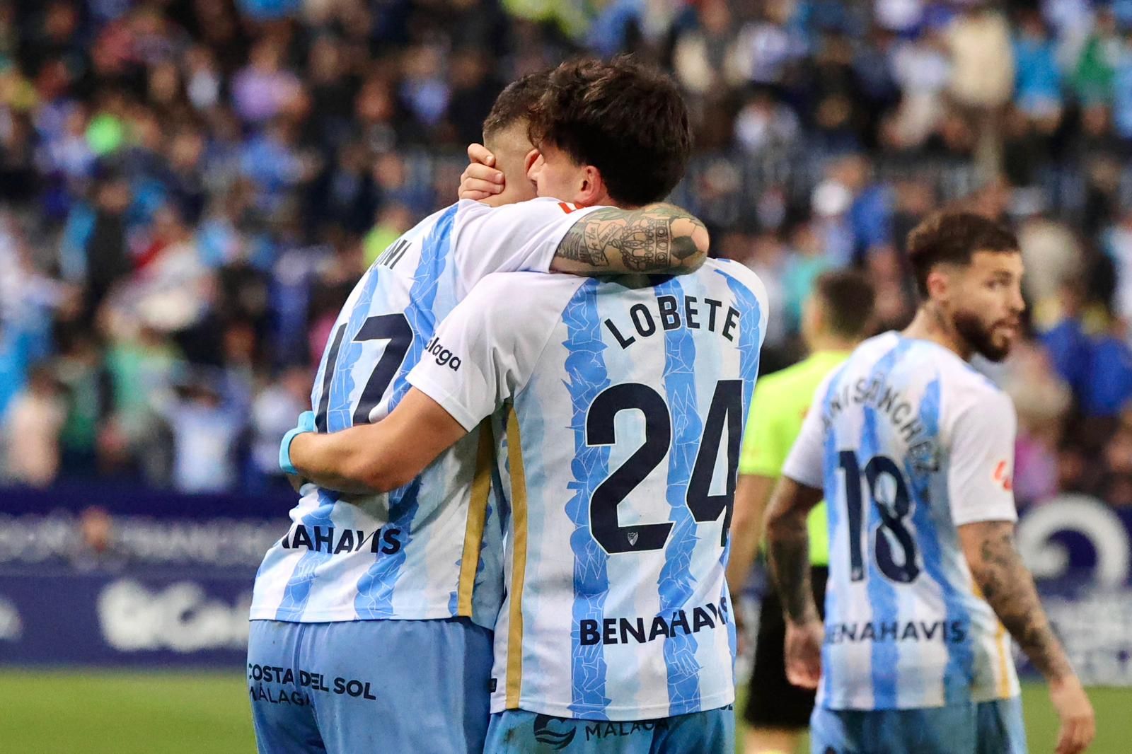 Lobete y Dioni se abrazan