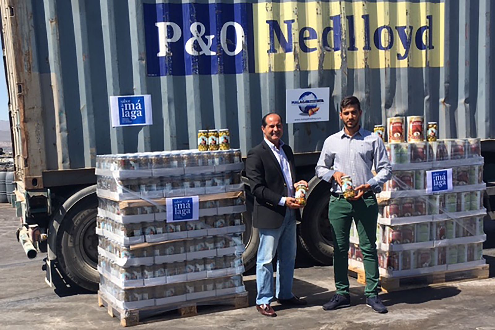 Jaime Delgado, presidente de Málaga Trading y Fernando Chicón, propietario de la empresa de aceitunas.