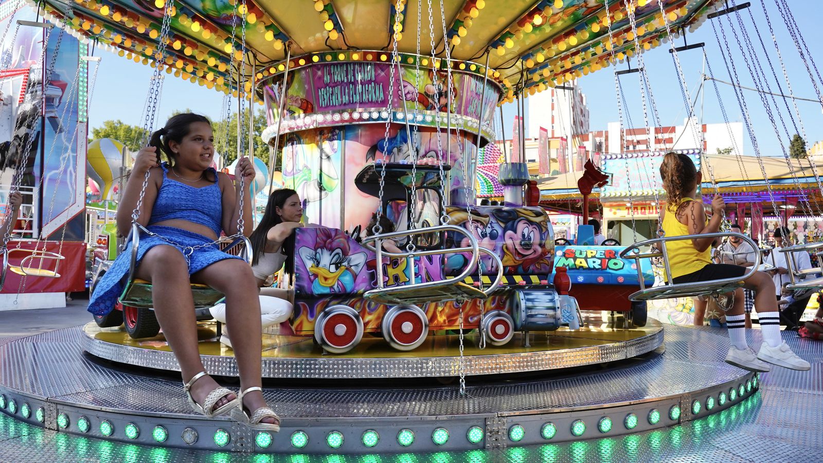 Fotos del día con descuento en las atracciones de la Feria de Algeciras