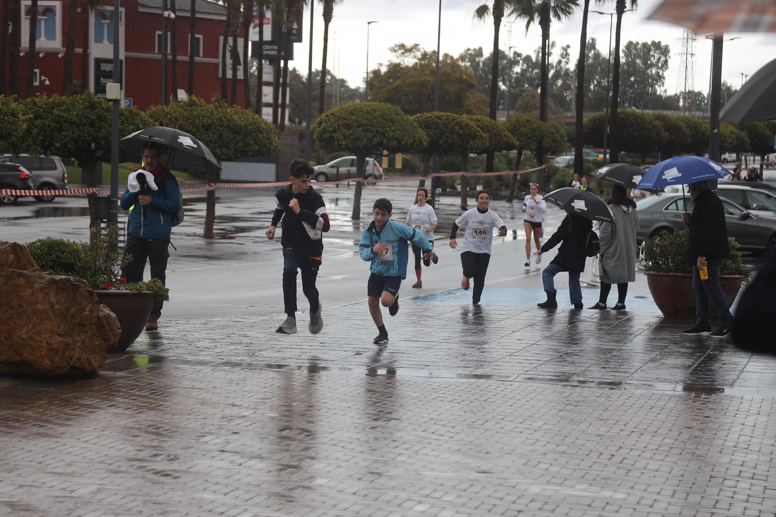 La Carrera por el Día Internacional de la Mujer en Málaga, en fotos